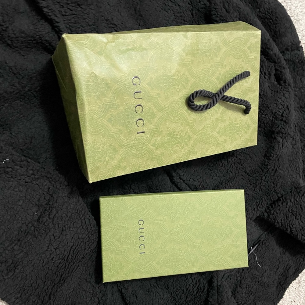 Authentic Gucci Wallet new. No wear marks. Traditional Gucci pattern